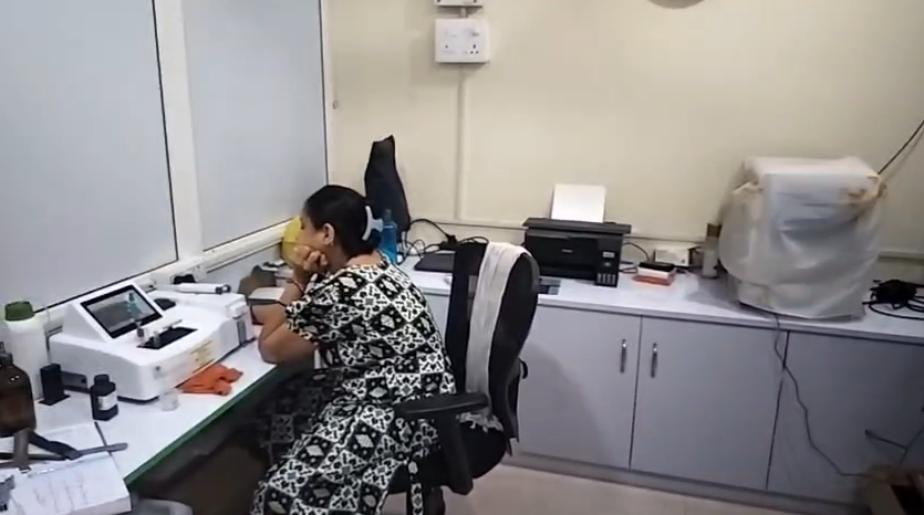 Lab technician at work inside the pathology lab in Aska